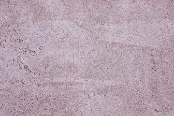 Fototapeta premium Textured concrete surface with subtle variations and light color tones