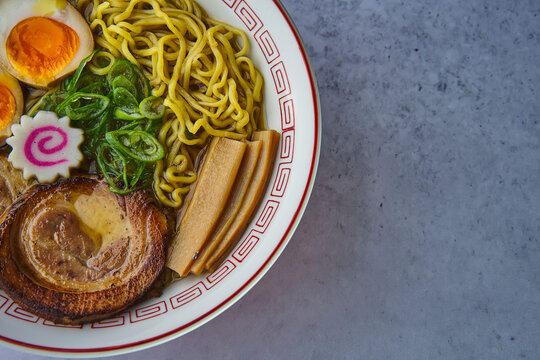 Ramen bowl with noodles, egg, chashu pork