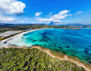 Fototapeta premium Aerial view of Cala Brandinchi beach, Sardinia with turquoise sea and Tavolara