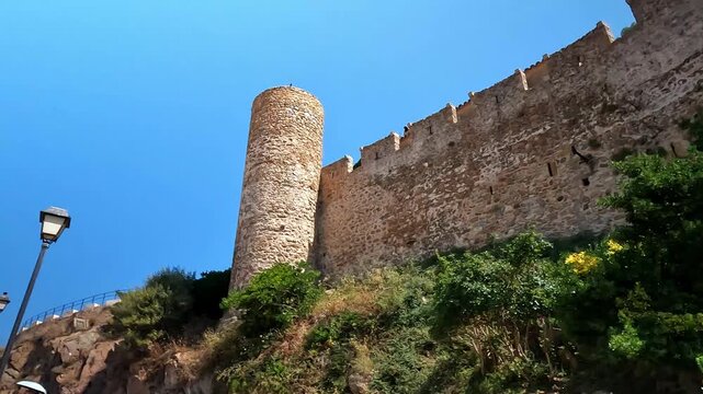 Tossa de Mar, Spain - May 25, 2026: Medieval stone tower.