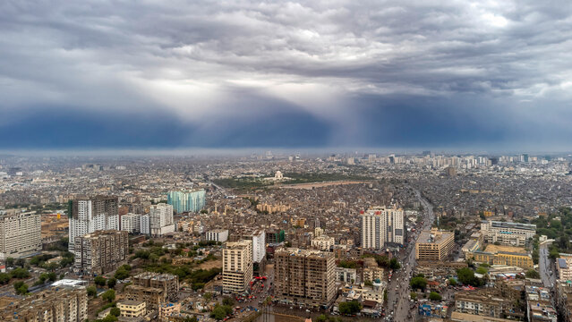 Karachi, Pakistan - May 10, 2026: Dramatic aerial view of Karachi city under heavy monsoon rain clouds. Panoramic urban cityscape of Karachi