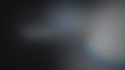Obraz premium Soft gradient grainy texture background, with blurred dark, gray, blue, and, white tones creating, abstract atmospheric effect