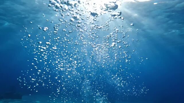 Clear water with bubbles and sunlight, underwater scene