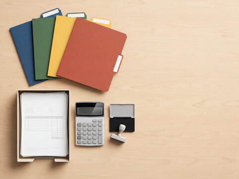Freelancer invoice sorting station for bookkeeping workflows