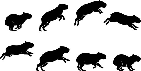 Obraz premium Vector set of capybara silhouettes showing dynamic movement and walking poses for graphic design