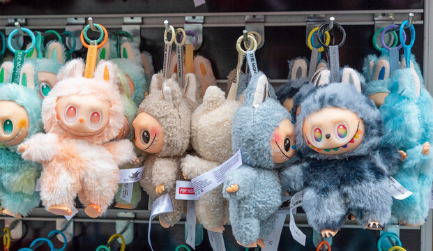 Turkey, Istanbul, May 20, 2026 Toys named Labubu are displayed in a shop at a market, hanging on a metal rack in bright colors