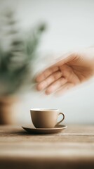 Fototapeta premium Motion blur of hand reaching for coffee cup on wooden table, capturing morning rush in bright, airy kitchen