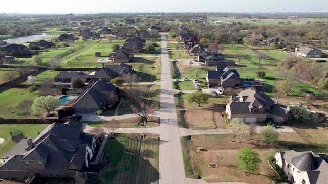 Aerial video of Taylor Oaks subdivision in Double Oak Texas heading south on whistling duck ln