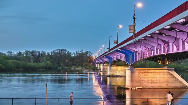 WARSAW, POLAND - APRIL 15 2018: Slasko-Dabrowski Bridge is a bridge over the Vistula River in Warsaw. It was built from 1947 to 1949 on the pillars which remained from the Kierbedzia Bridge.