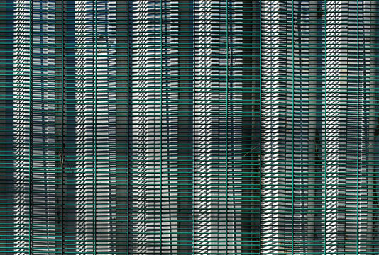 Metal grid on metallic surface, Rio de Janeiro, Brazil