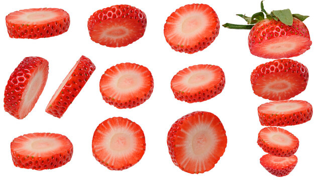 A varied set of thin round slices and cuts of ripe red strawberries in different angles and positions, isolated on background