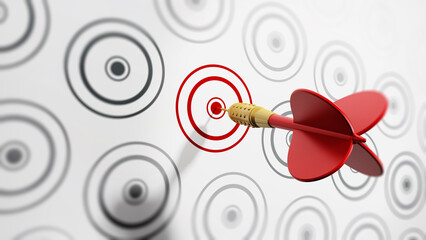 Red dart hitting target © Destina