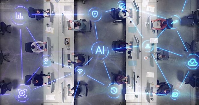 Top Down View of Office With Multiethnic Employees Working at Computer Desks as Linked Visualization Layer Appears, Glowing Blue Lines and Ai Icons Represent Machine Learning, Analytics and Security.