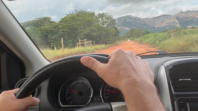 Driver's viewpoint on the dirt road of Serrado Park in Porteirinha, Minas Gerais, Brazil