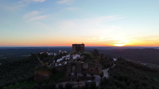 Drone Flyover Above Evoramonte Castle Toward Sunset in Alentejo
