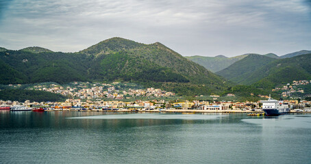 Fototapeta premium The Igoumenitsa Town and harbour view from sea in Greece