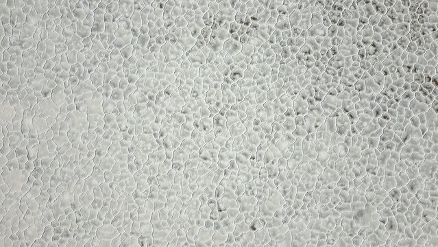 Aerial view of the hexagonal salt crust patterns on the surface of Salinas Grandes, Tumbaya, Jujuy, Argentina.