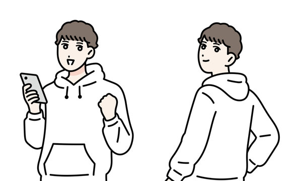 笑顔の若い男性の立ち姿　スマホを操作している