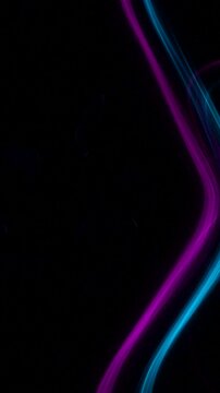 Neon purple and blue light trails create an abstract, vibrant pattern on a dark background.
