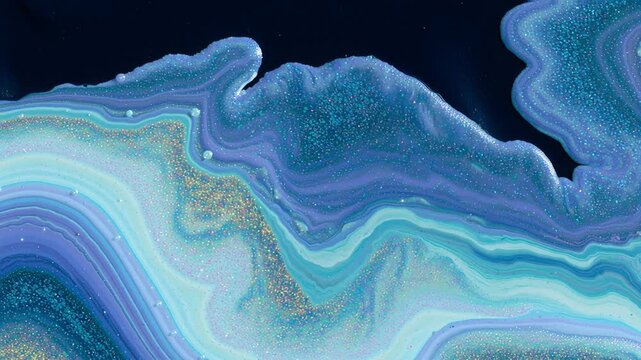 Electric blue and cyan abstract fluid art with glittery texture flowing in waves, showcasing vibrant colors and intricate patterns in a continuous design