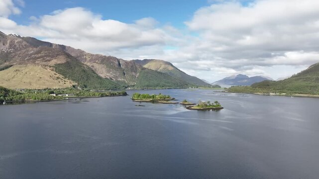 Left Pan Above Loch Leven with Blue Sky and Snow‑topped Glencoe Mountains