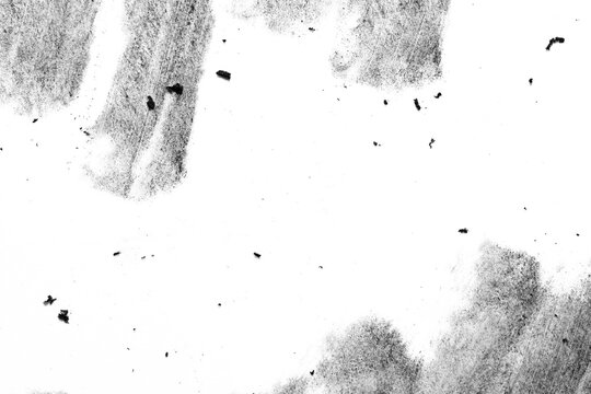 Macro black charcoal border texture with dusty soft edges, scattered dark fragments, and wide negative space, isolated on transparent background for overlays, frames, and design use.