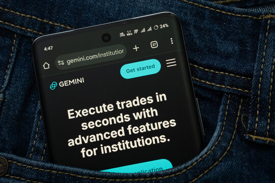 Dhaka, Bangladesh- 15 June 2025: A smartphone displaying the Gemini web interface peeks out of a denim pocket.