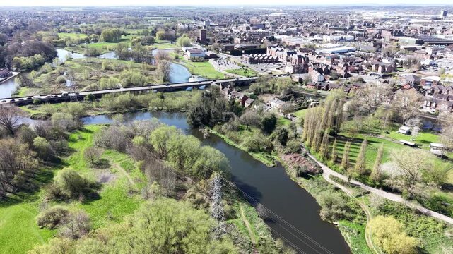 4K drone footage showing Staffordshire hills above open pasture in bright daylight.