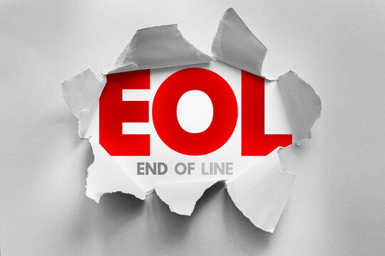 EOL text displayed through torn paper background, showing a technology concept related to product lifecycle, support ending and transition planning