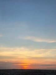 Obraz premium Pastel Sunset Sky Over Rural Landscape