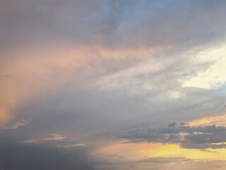 Fototapeta premium Pastel Storm Clouds During Colorful Sunset