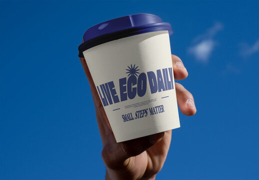 Eco Disposable Cup Mockup Held Against Sky