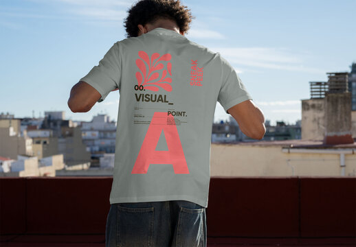 Mockup of a Plain back T-Shirt on a Rooftop
