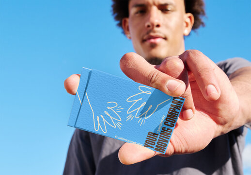 Mockup Template of  Business Card in Hand