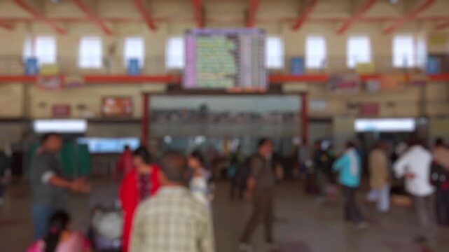 Bokeh view of people at the Varanasi Junction railway station, Varanasi, India. Blurred background footage.