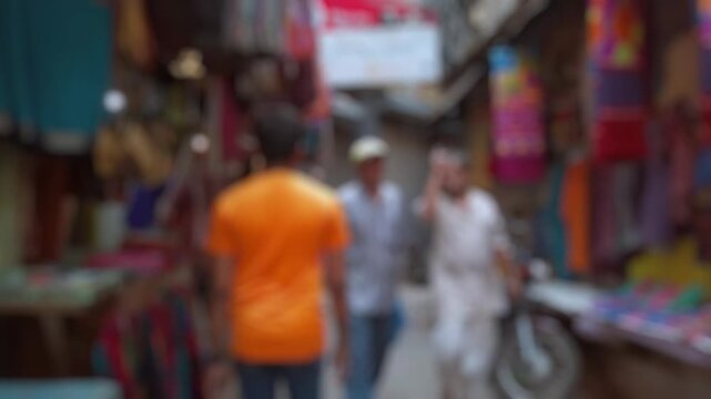Bokeh view of life on the streets of Varanasi, India. Blurred background footage.