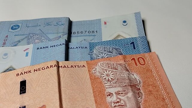 Close-up of Malaysian 1 Ringgit and 10 Ringgit banknotes