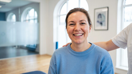 Fototapeta premium Smiling patient in therapy center expressing wellness and positivity for healthcare, mental health support, therapy blogs, and wellness promotion