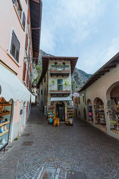 Scenic landscape of Limone sul Garda village, Lake Garda, Italy. Picturesque colorful houses and a peaceful harbor surrounded by blue waters and majestic alpine mountains. - Limone sul Garda, may 2026