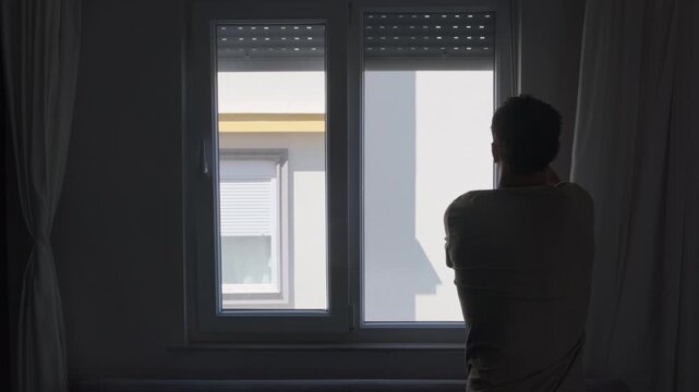Opening apartment window with unexpected wall view, rental housing reality and urban isolation concept in small hotel room or temporary living space