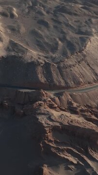 Atacama Desert, Chile. San Pedro de Atacama, Valle de la Luna. Aerial view by drone. Vertical video