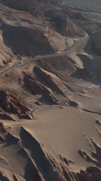 Atacama Desert, Chile. San Pedro de Atacama, Valle de la Luna. Aerial view by drone. Vertical video