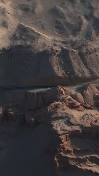 Atacama Desert, Chile. San Pedro de Atacama, Valle de la Luna. Aerial view by drone. Vertical video