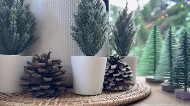 Artificial pine trees and pine cones for Christmas decoration.