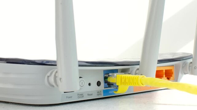 Detail of the rear ports of the advanced Wi-Fi router, showcasing technological innovation for a faster and more stable connection.