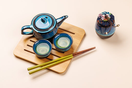 Asian tea ceremony set with teapot and cups