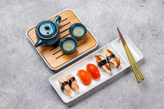 Sushi set with tea and small teapot