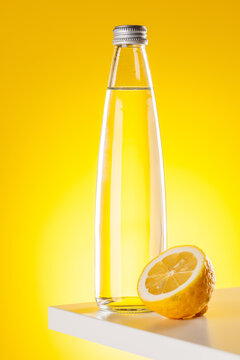 Sparkling water bottle with lemon yellow background refreshment