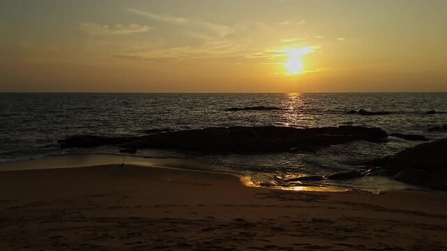 Beautiful Golden Sunset Over the Ocean Creating a Calm and Peaceful Evening Seascape at beach