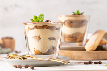 Authentic Italian Tiramisu Dessert in Glass Cups © anammarques